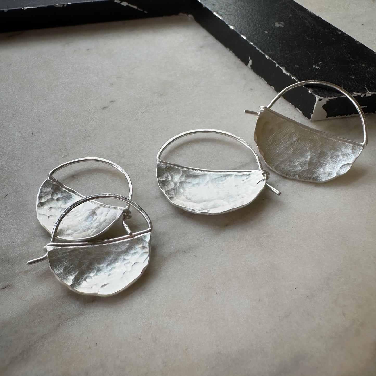 bright silver half circle hoop earrings, size small and medium
