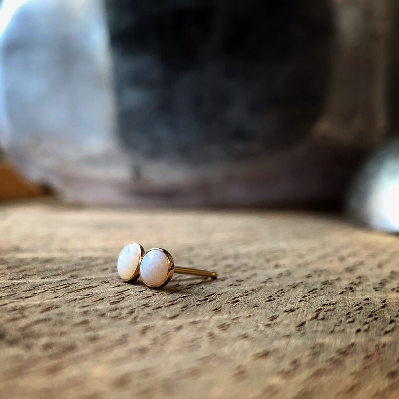 australian opal earrings. Bezels are rose gold and opals have a pink tone