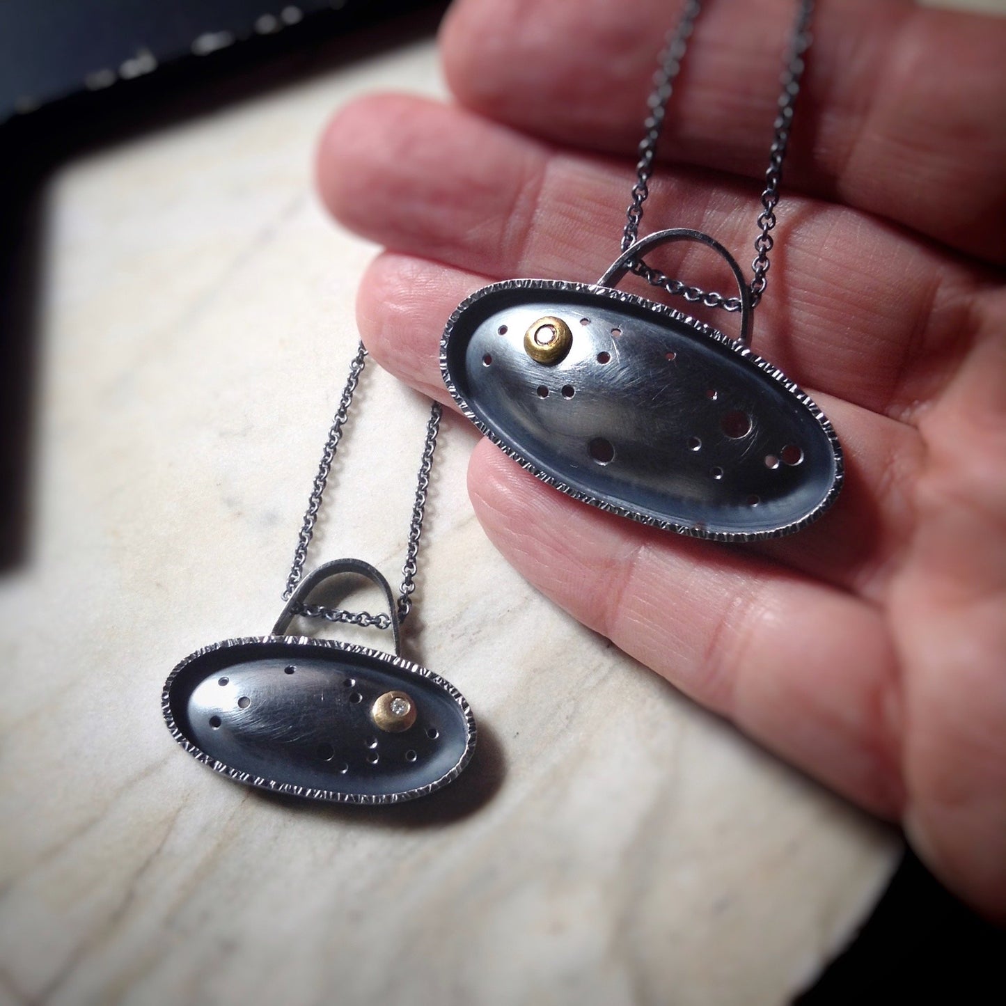 contemporary night sky pendant with golden moon and moissanite