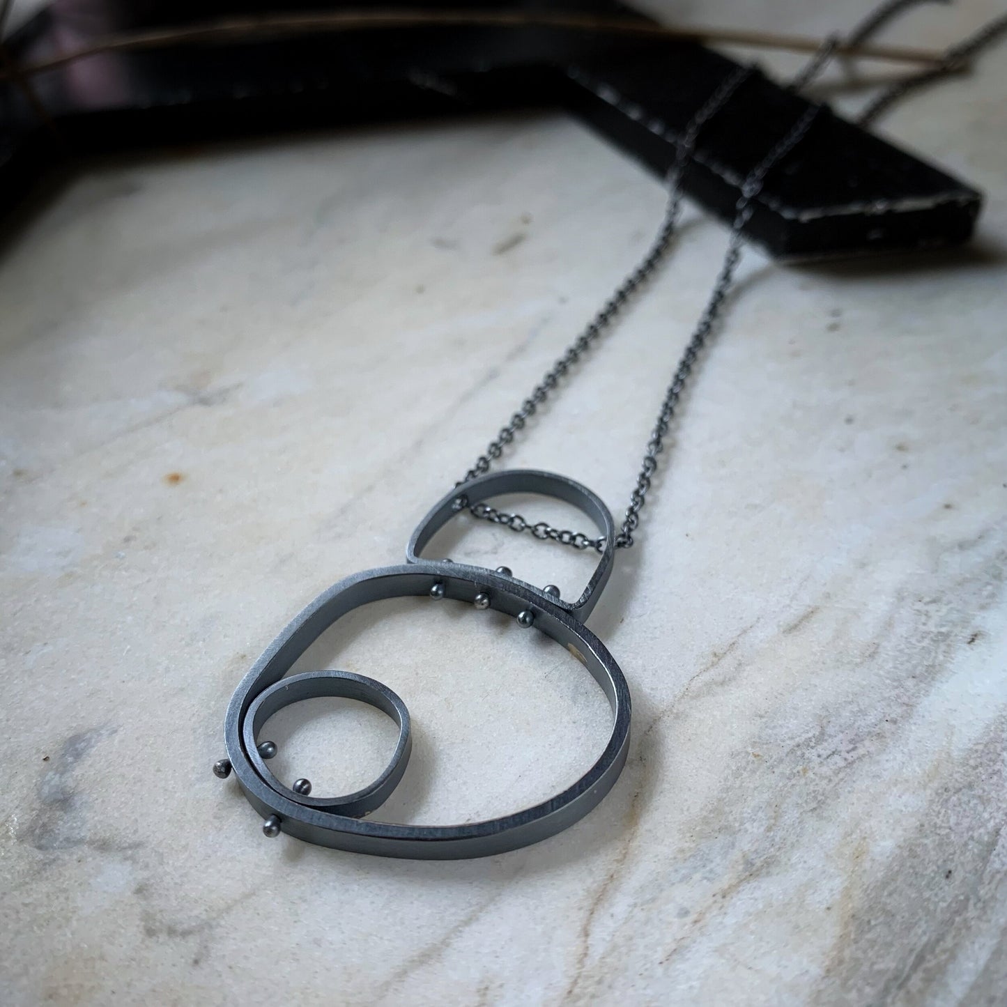 Circle in circle modern industrial sterling pendant