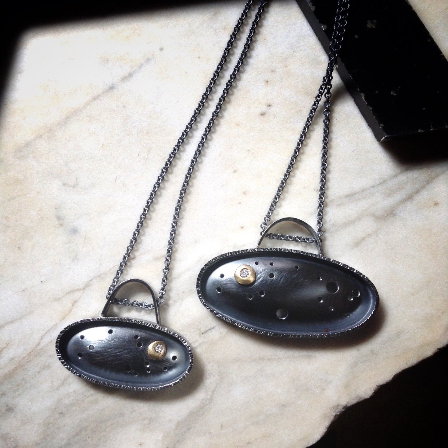 contemporary night sky pendant with golden moon and moissanite