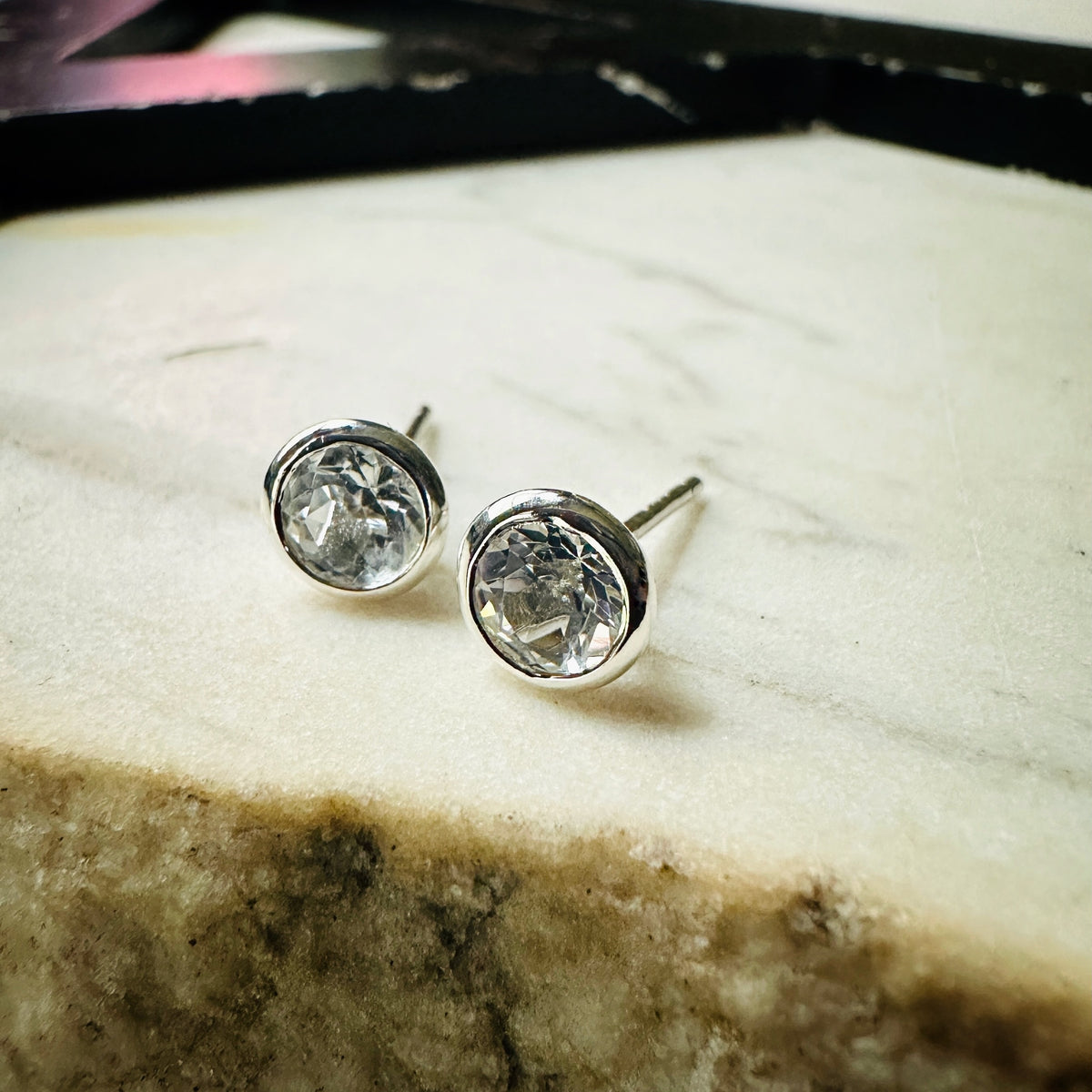 5mm white topaz bezel set stud earrings in sterling silver 