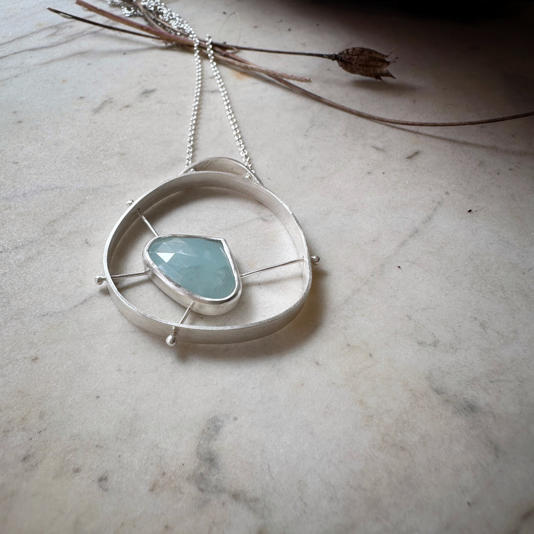 Sterling silver atomic pendant with aquamarine