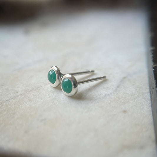 Emerald bezel set stud earrings in sterling silver