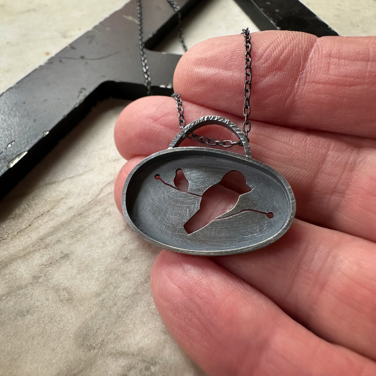 Oxidized sterling silver bird pendant, dark and moody, modern silhouette