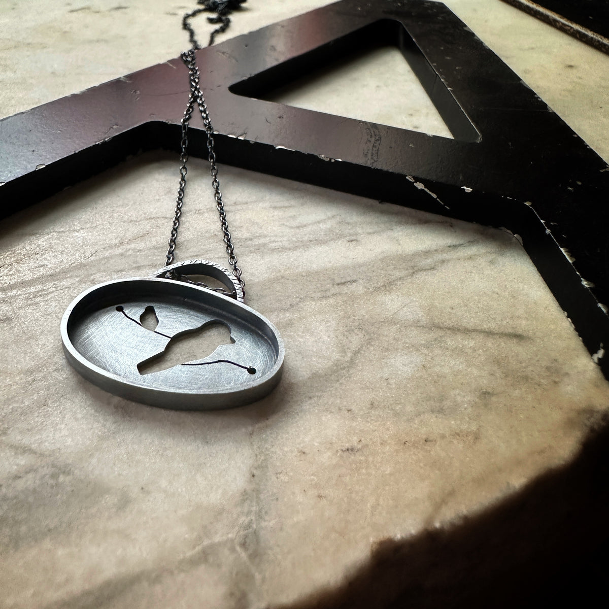 Oxidized sterling silver bird pendant, dark and moody, modern silhouette