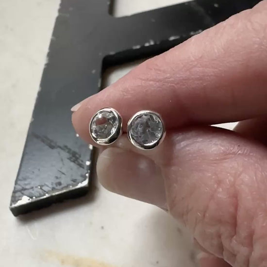 5mm white topaz bezel set stud earrings in sterling silver 