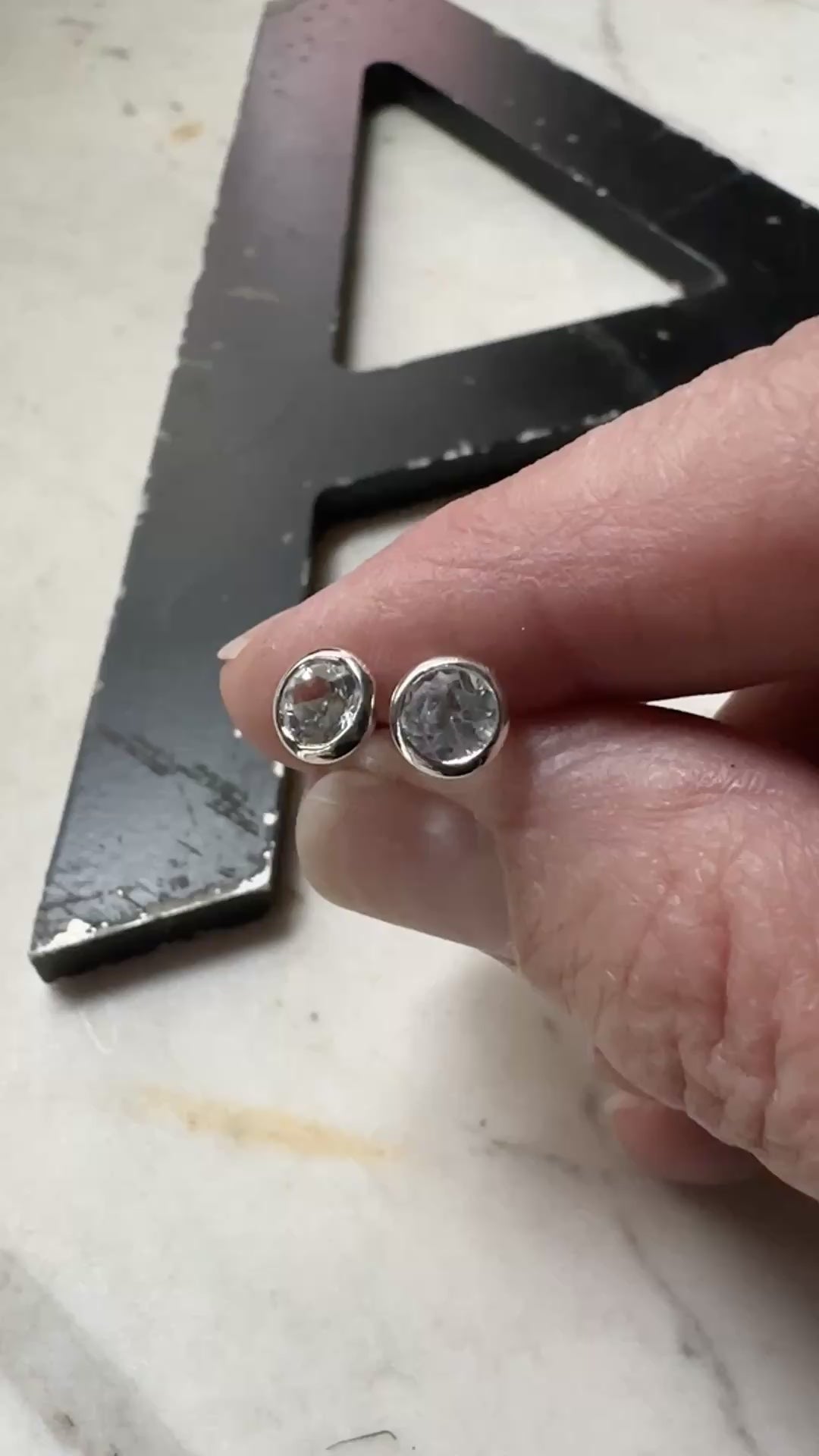 5mm white topaz bezel set stud earrings in sterling silver 