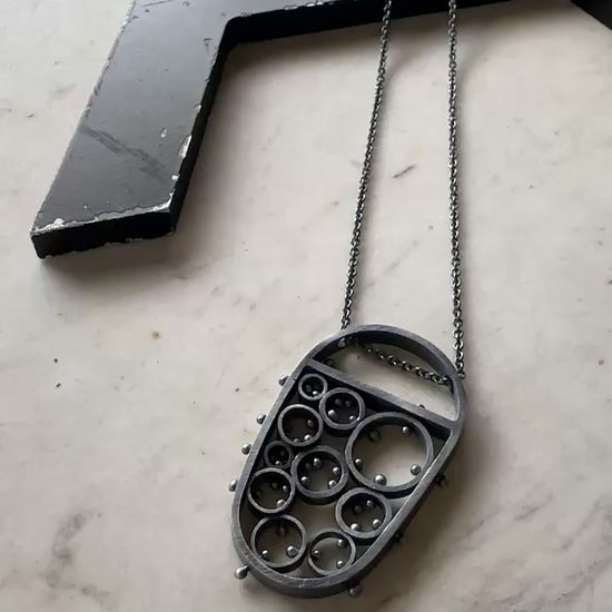 modern oxidized sterling silver pendant handmade by Ann Hartleystudio