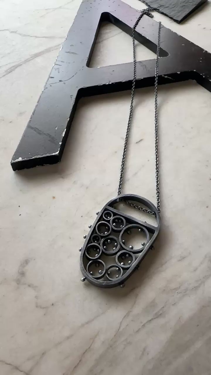 modern oxidized sterling silver pendant handmade by Ann Hartleystudio