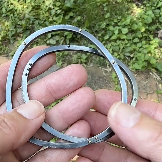 A movie showing how the oxidized silver bangle bracelets look from all sides.