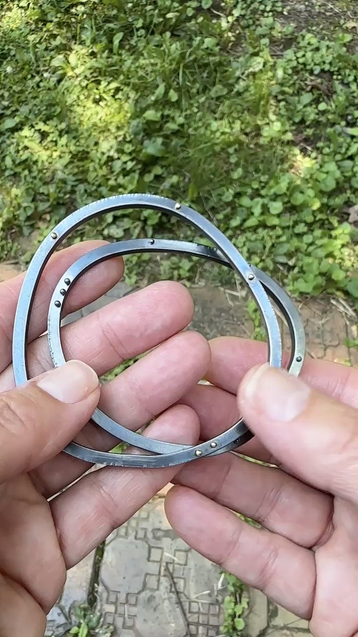 A movie showing how the oxidized silver bangle bracelets look from all sides.