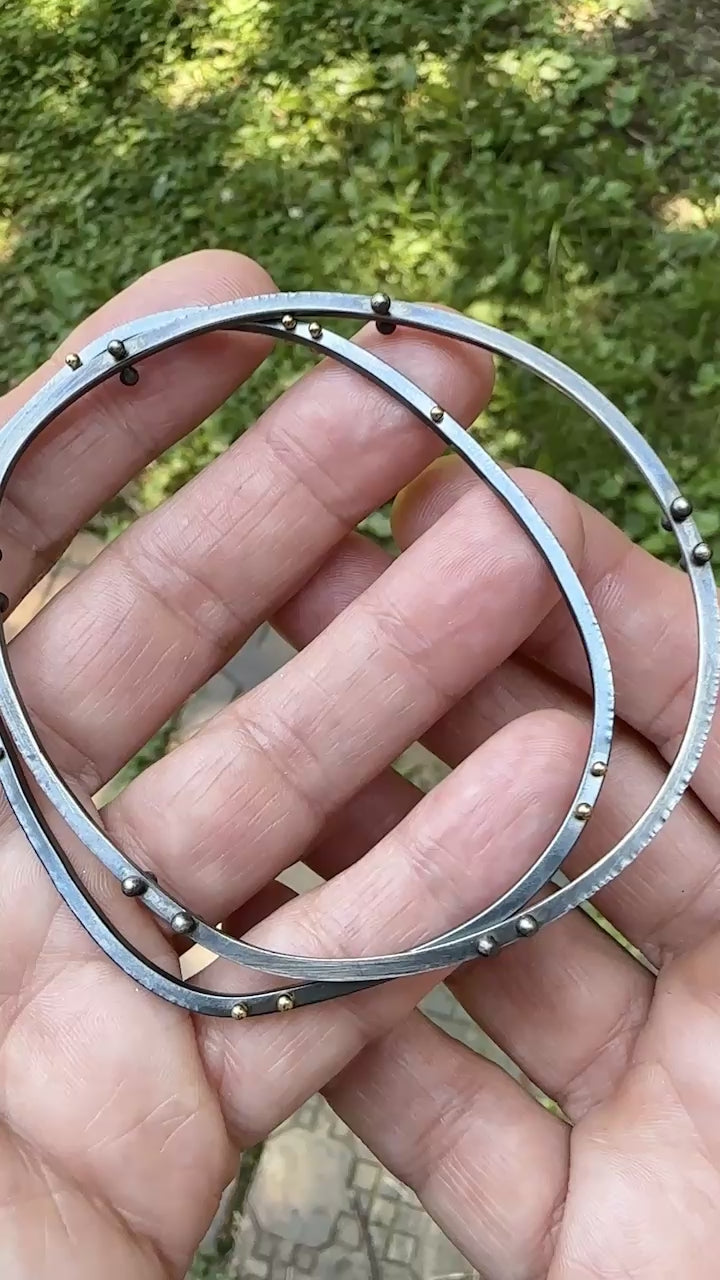 A movie showing how the oxidized silver bangle bracelets look from all sides.