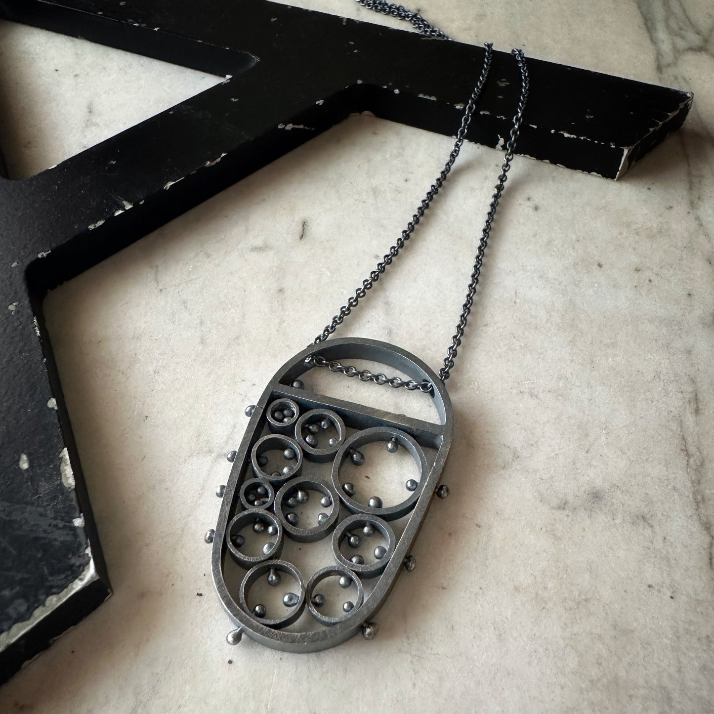 modern oxidized sterling silver pendant handmade by Ann Hartleystudio