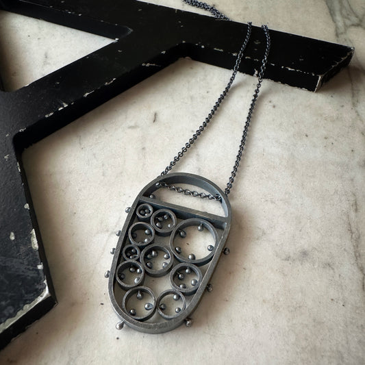 modern oxidized sterling silver pendant handmade by Ann Hartleystudio