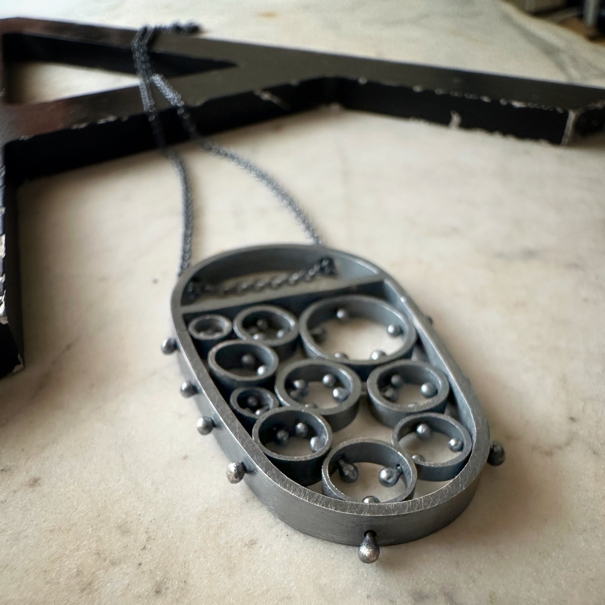 modern oxidized sterling silver pendant handmade by Ann Hartleystudio