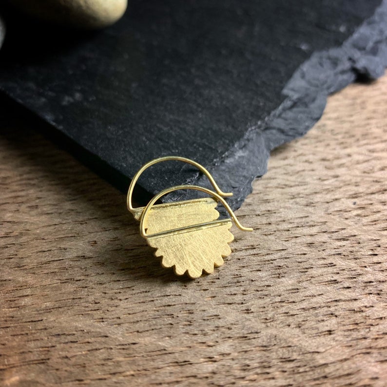 18k yellow gold hoop earrings shaped like modern clouds.