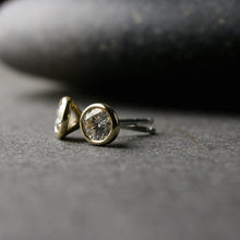 Load image into Gallery viewer, a pair of yellow gold Moissanite stud earrings 
