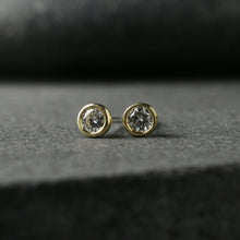 Load image into Gallery viewer, 18k yellow gold bezel set earrings with 3mm Moissanite stones

