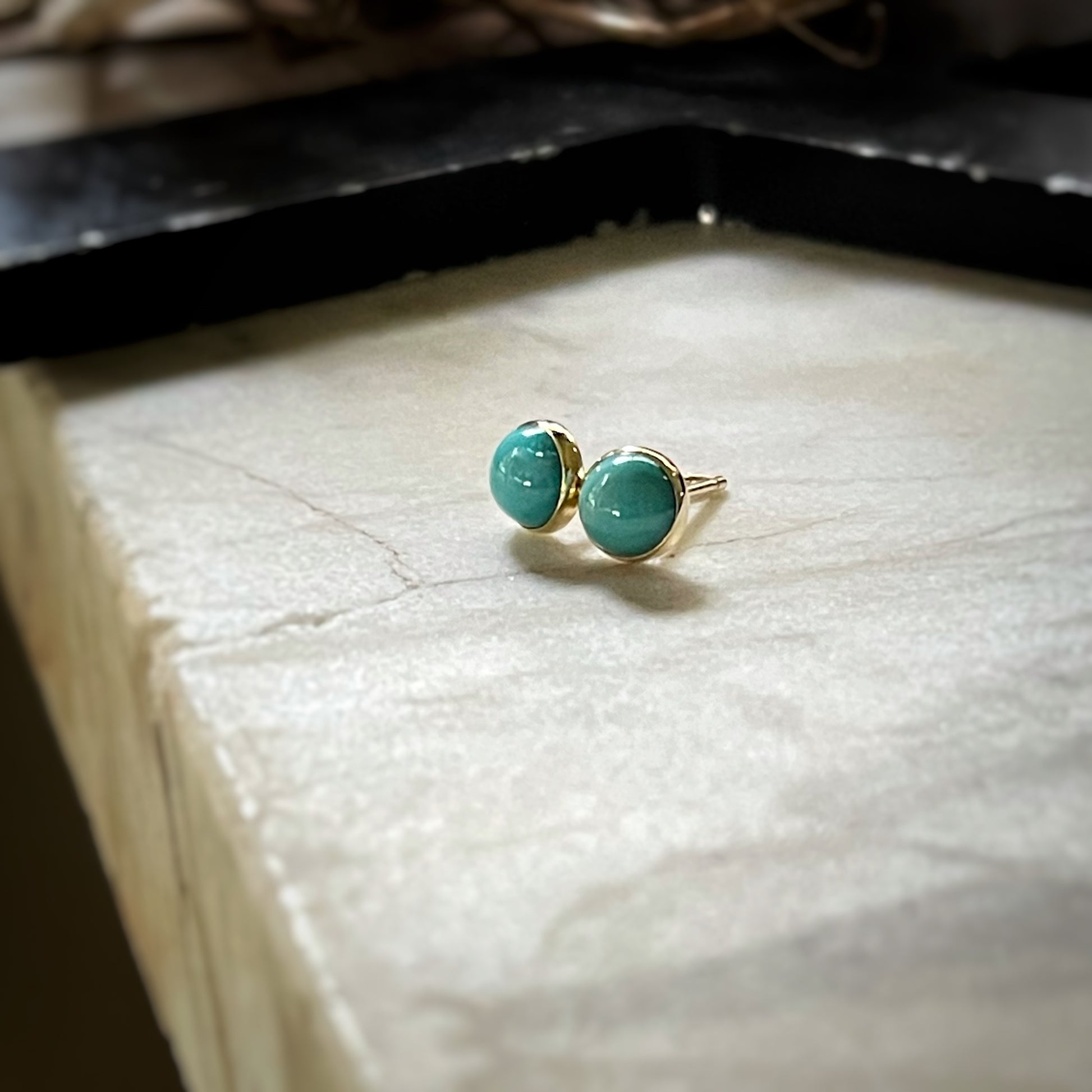 5mm nevada turquoise stud earrings set in 18k yellow gold