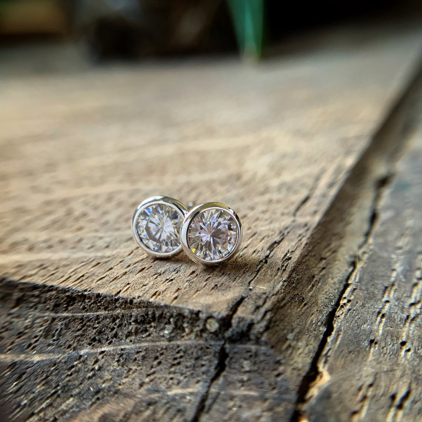 Very large sterling silver Moissanite bezel set stud earrings.