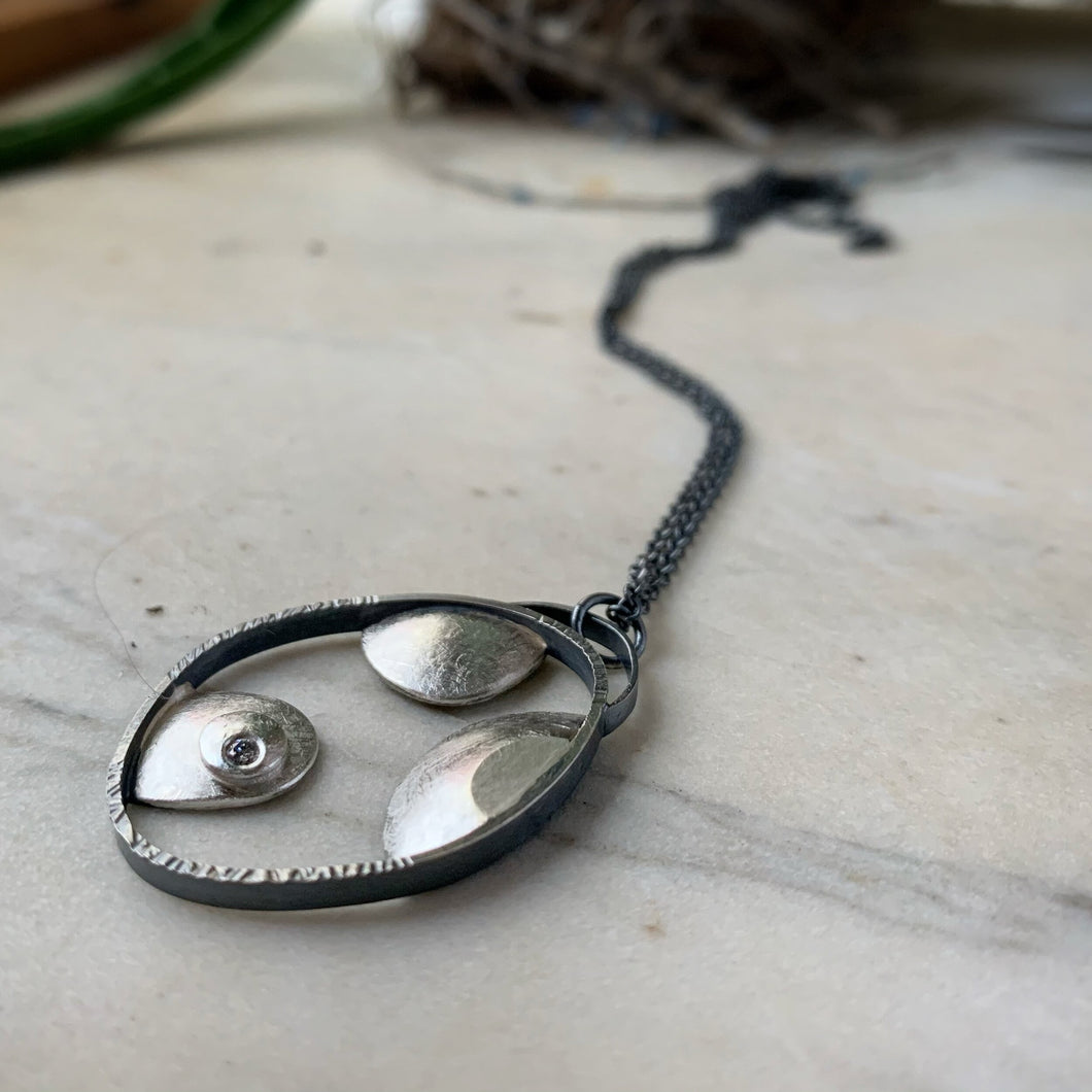 The Islands pendant, bright and oxidized