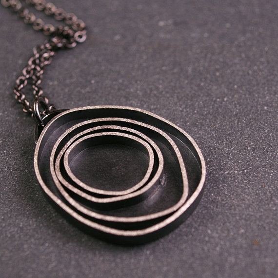 another version of oxidized sterling silver pendant with concentric circles