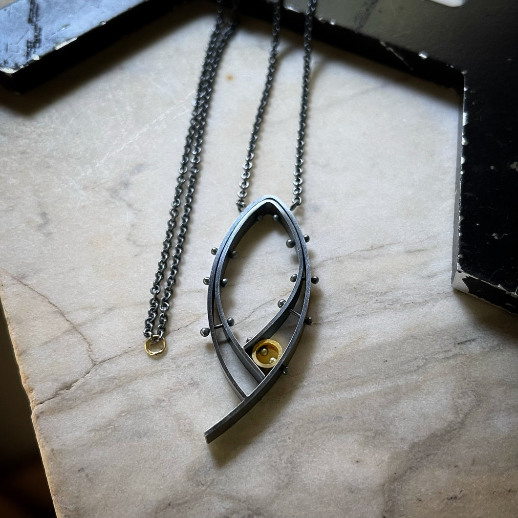 Oxidized silver and 18k yellow gold riveted modern pendant