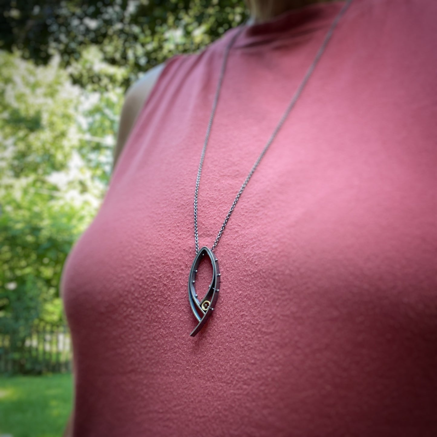 Oxidized silver and 18k yellow gold riveted modern pendant