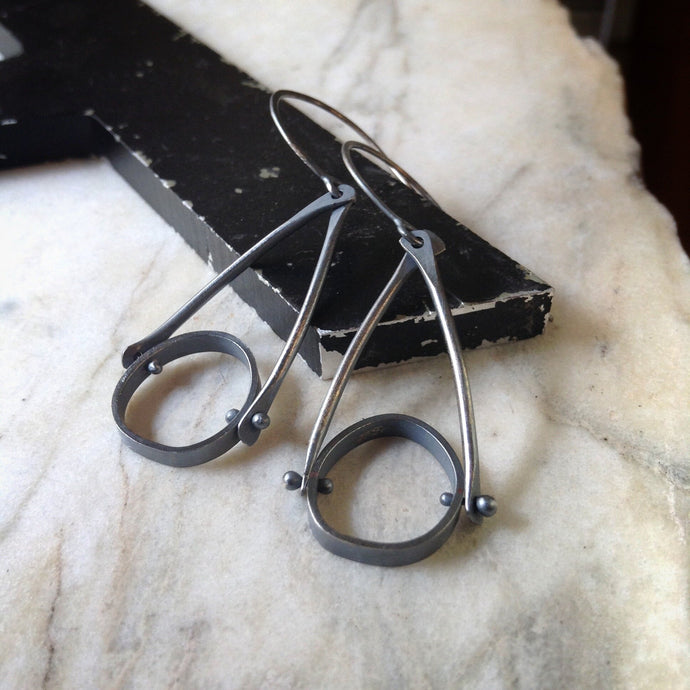 oxidized sterling silver earrings with an industrial look and organic circles