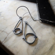 Load image into Gallery viewer, both sizes of earrings in oxidized sterling silver with an industrial look and organic circles
