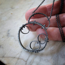 Load image into Gallery viewer, industrial pendant made from sterling silver of interconnected circles.
