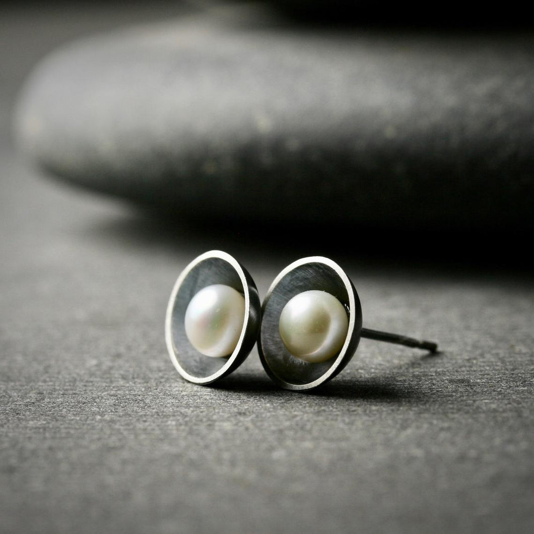 two white freshwater pearls in oxidized sterling silver cups