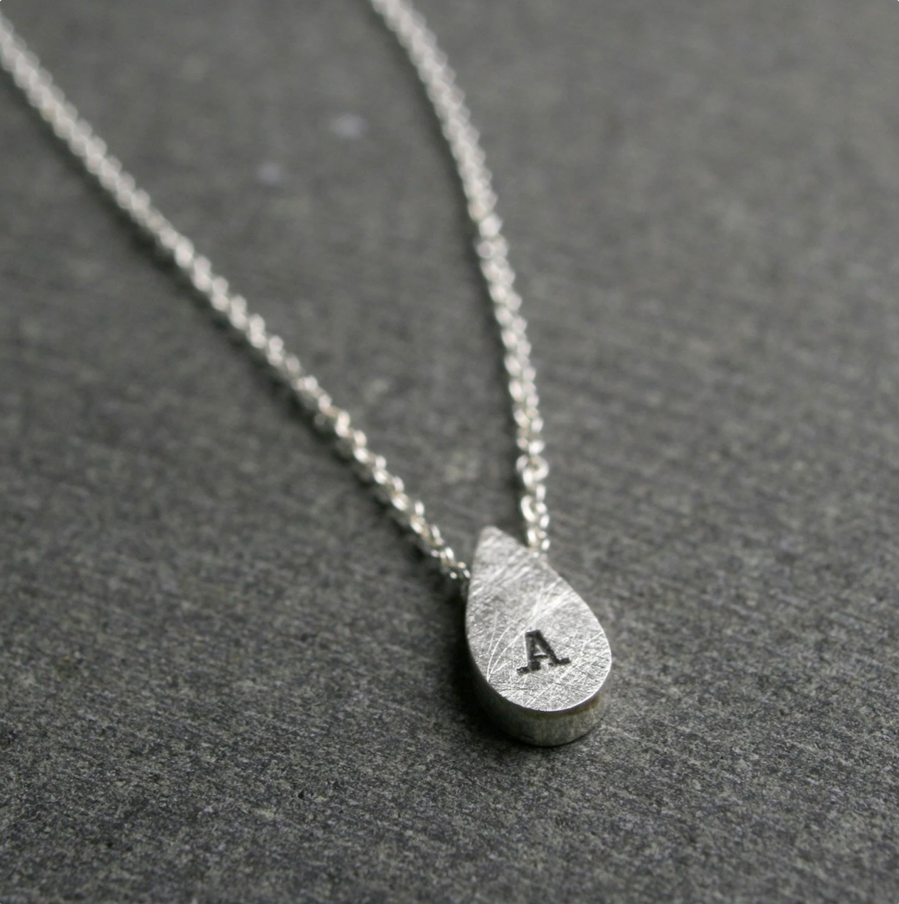 Tiny teardrop initial pendant