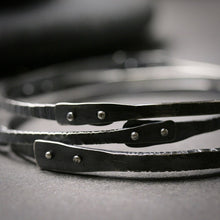 Load image into Gallery viewer, detail of silver rivets on oxidized bangle bracelets
