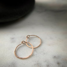 Load image into Gallery viewer, two small hammered rose gold hoops earrings with circular clasps
