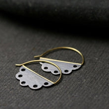 Load image into Gallery viewer, scalloped edge sterling silver hoop earrings with holes and gold ear wires
