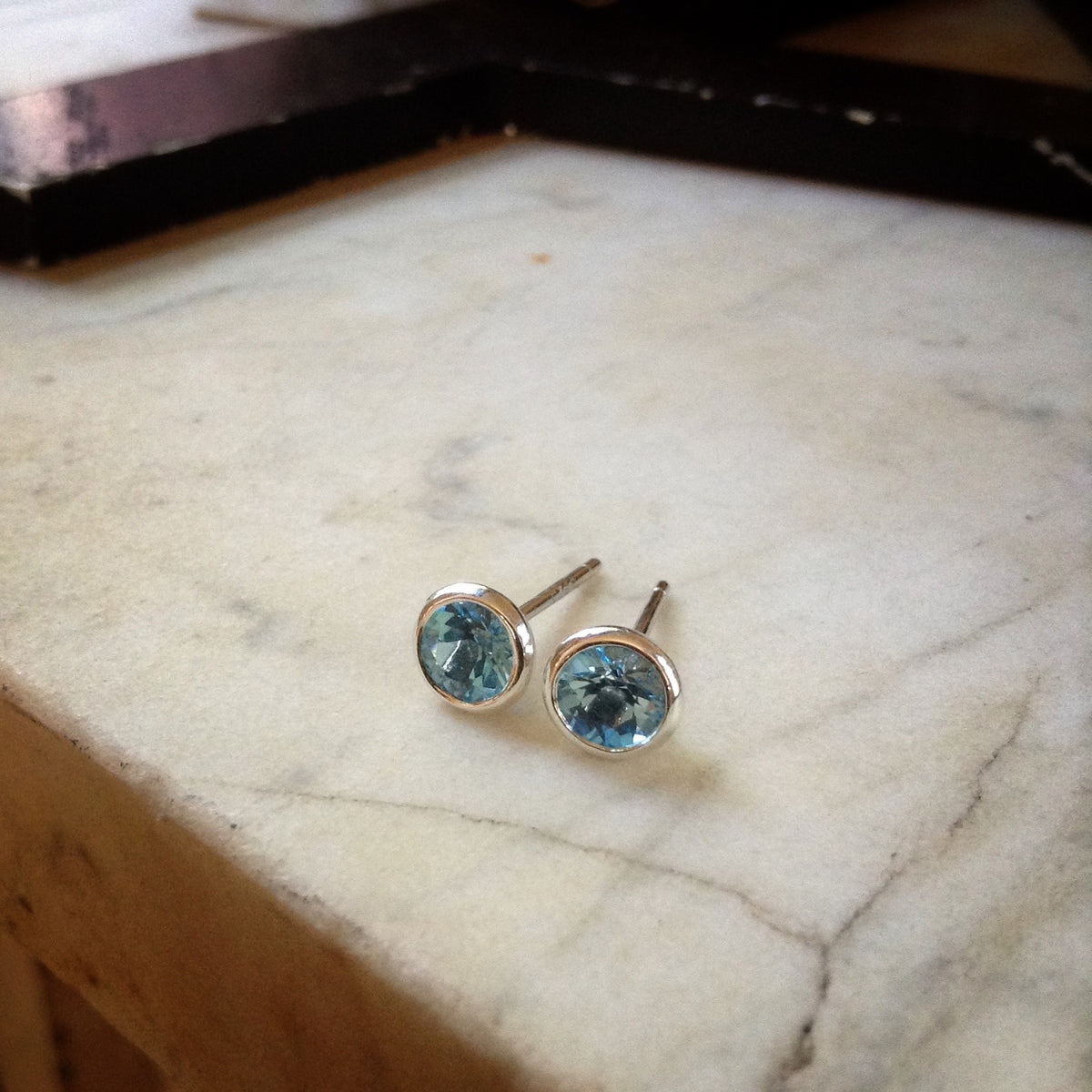 5mm Swiss blue topaz earrings bezel set in sterling silver 