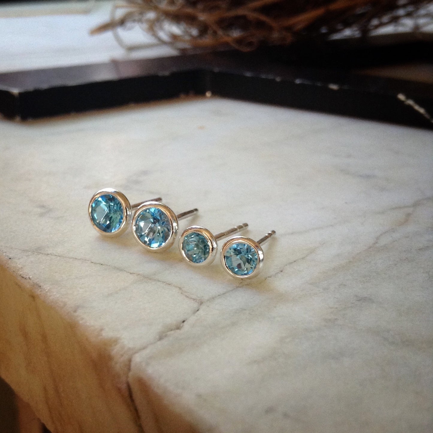 Swiss blue topaz martini studs