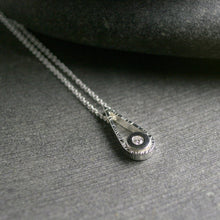 Load image into Gallery viewer, Sterling silver teardrop shaped pendant with a small diamond
