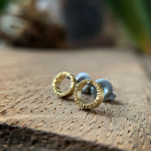 Load image into Gallery viewer, quarter inch yellow gold circles with hammered texture and oxidized silver posts and backs
