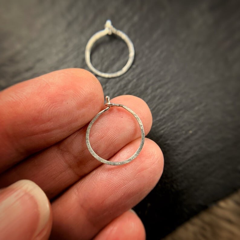 Tiny sterling silver hammered hoops