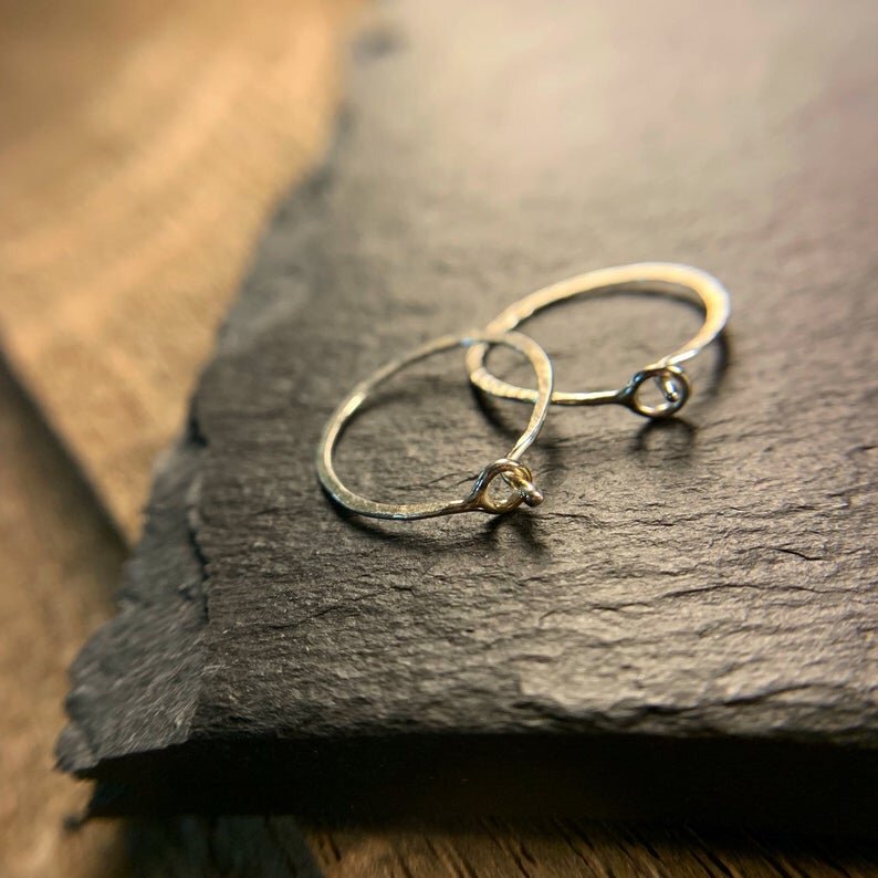 Tiny sterling silver hammered hoops