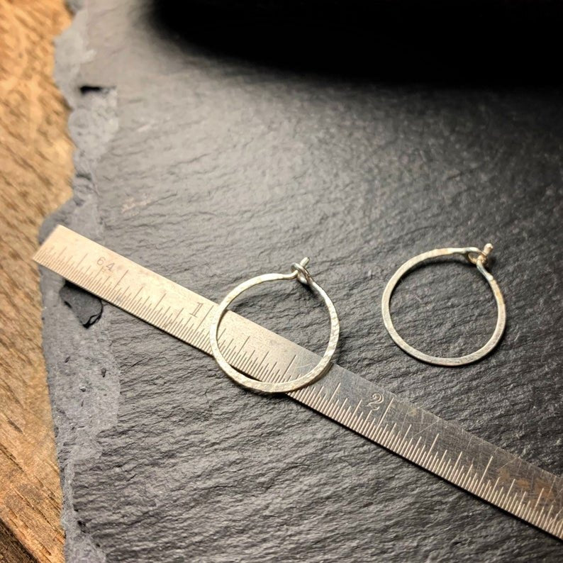 Tiny sterling silver hammered hoops