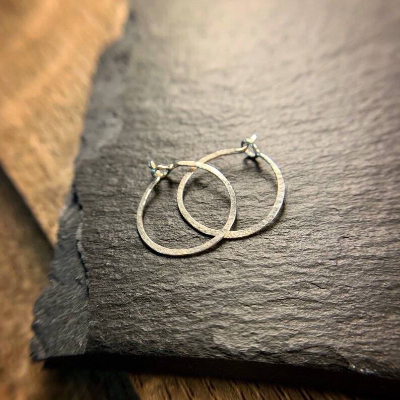 Tiny sterling silver hammered hoops
