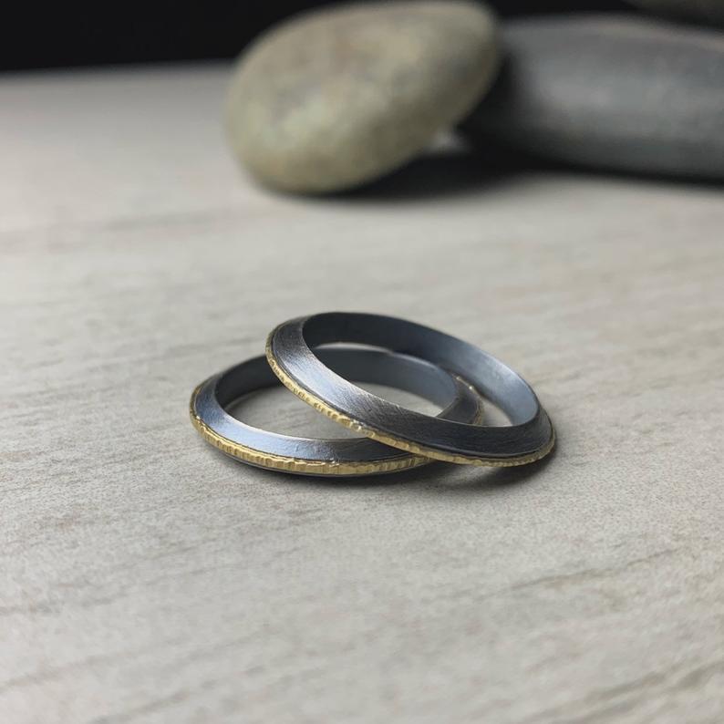 Darkened sterling silver rings with hammered 18k yellow gold accent