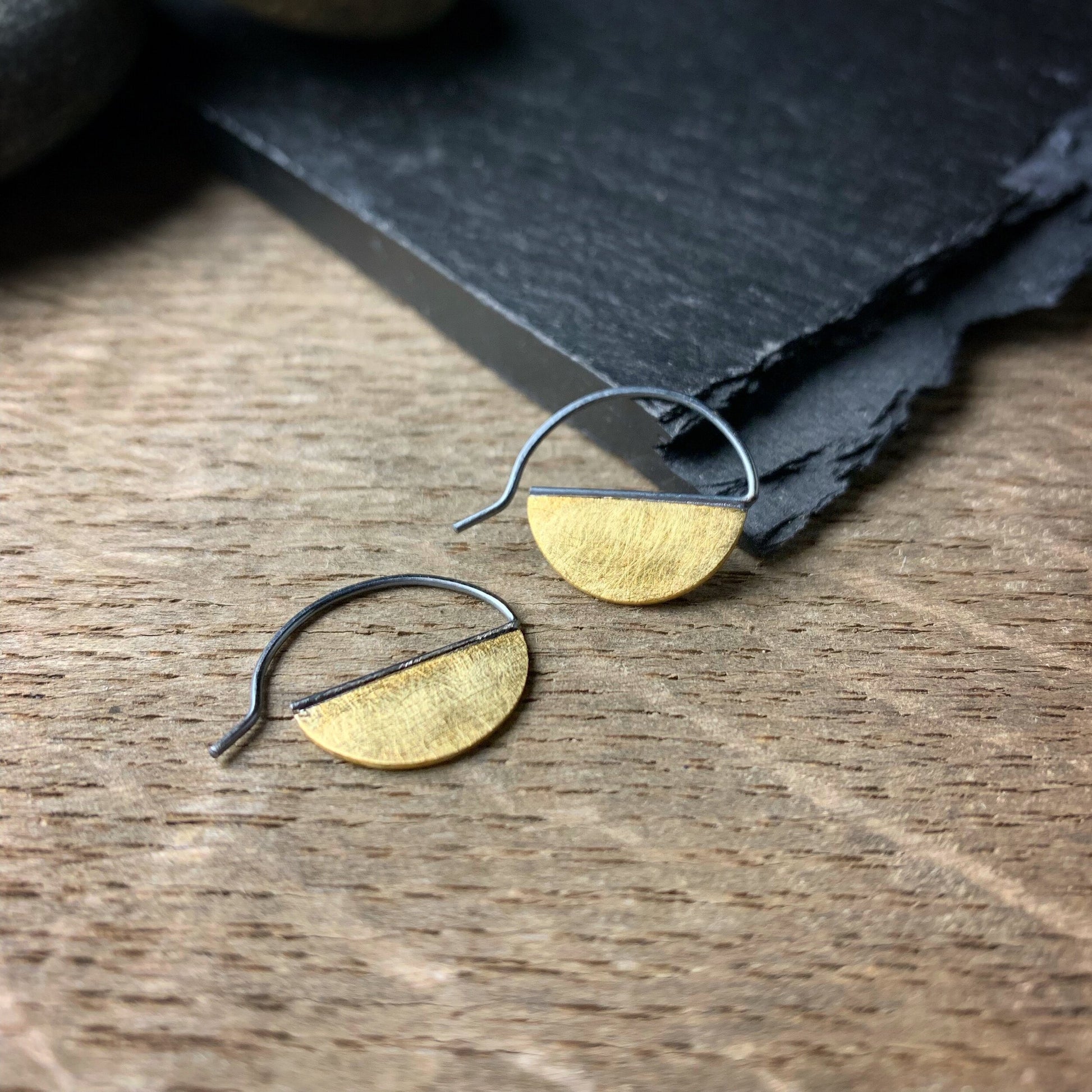 earrings with half discs of 18k yellow gold with oxidized ear wires 